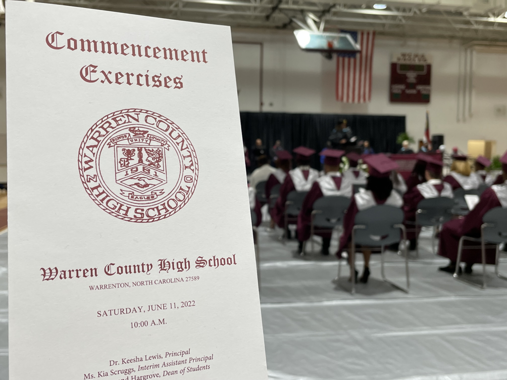 The Warren County High School Commencement Exercises program with the graduation in the background.