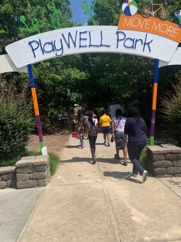 Students walking into the Poe Center's PlayWell Park