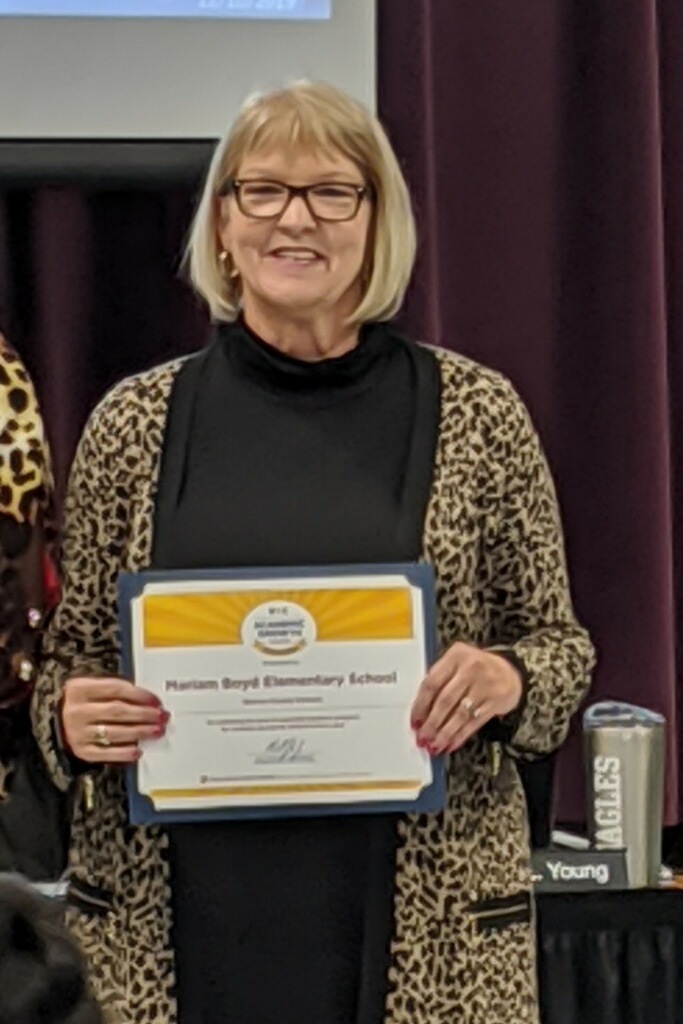 Principal Brewer is recognized for Mariam Boyd's 2019-2019 School growth.